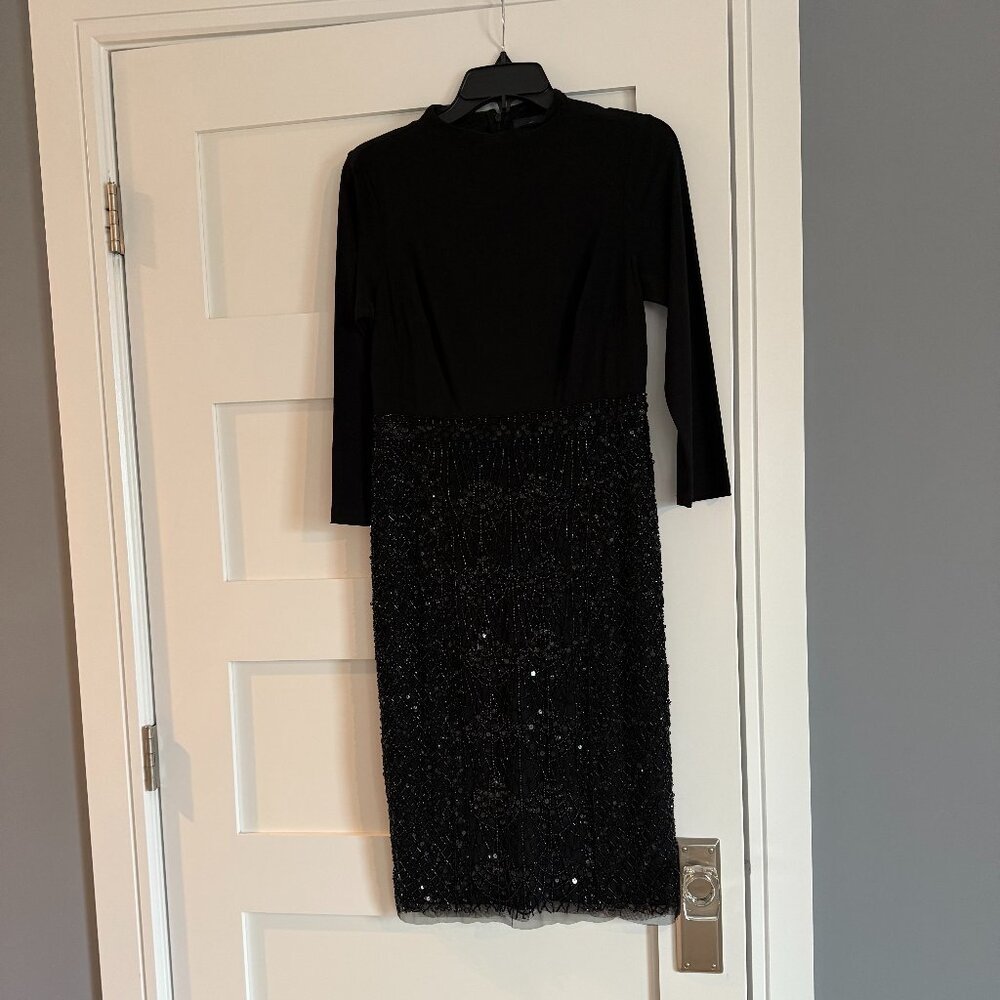 Black cocktail dress by Adrianna Papell